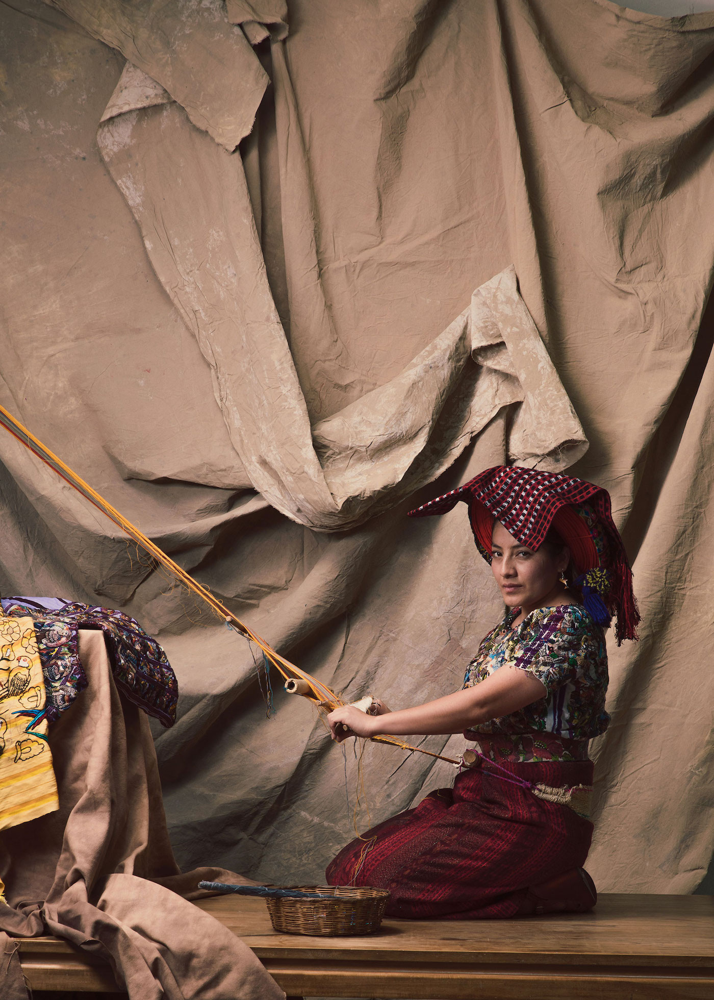 A Maya backstrap weaver (courtesy of Manny Rionda).